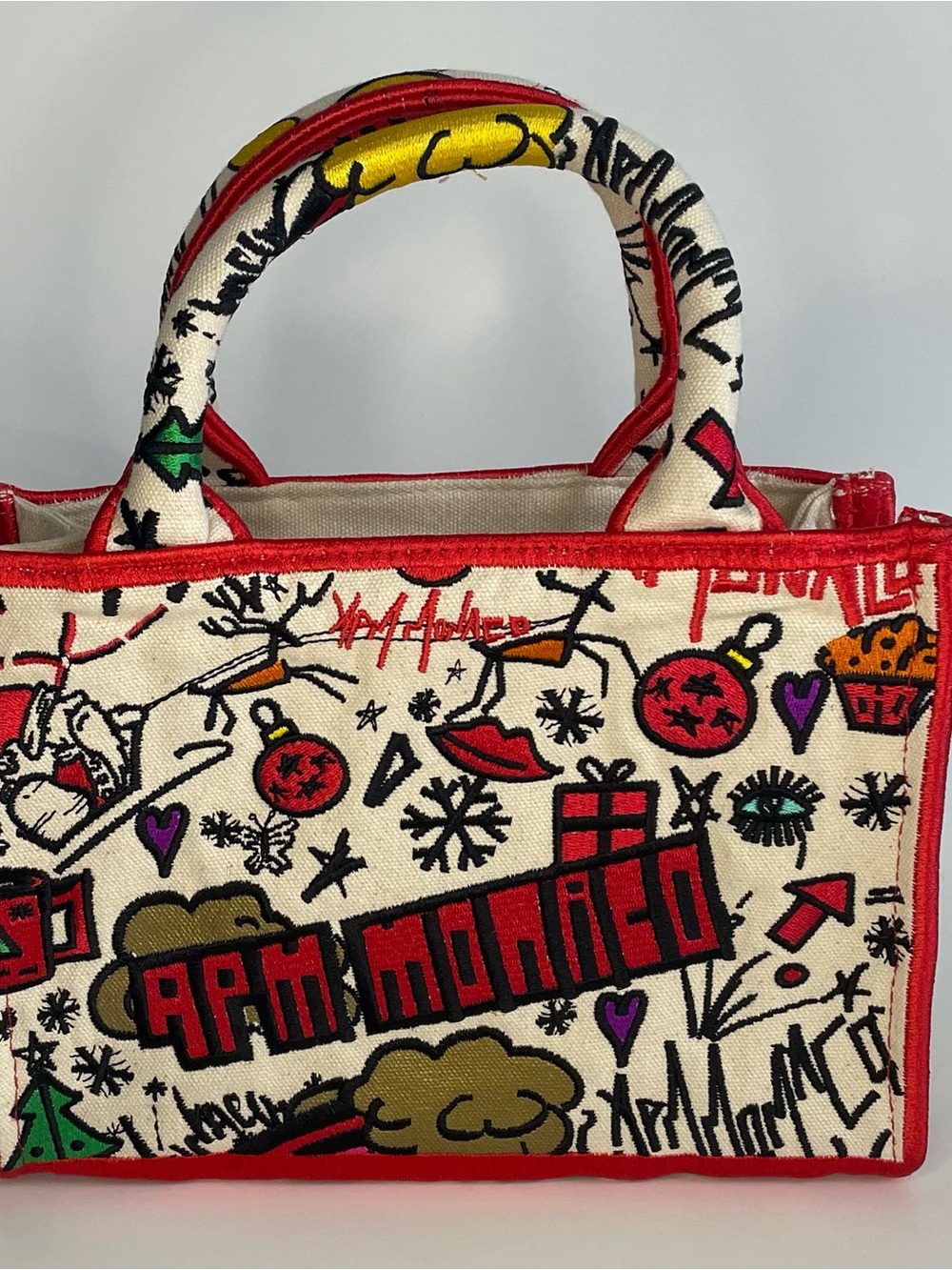 Anya Hindmarch Cream Canvas Tote with Red Trim & Multicolor Graphic